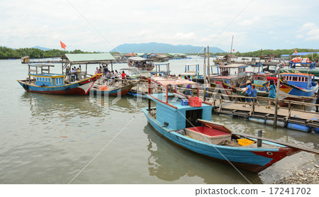 Tourists waiting at the pier for boarding to boat Tourists waiting at the pier for boarding to boat 17241702