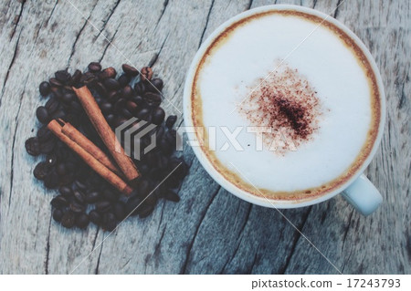 Hot coffee with bean and cinnamon sticks Hot coffee with bean and cinnamon sticks 17243793