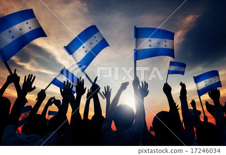 Silhouettes of People Holding Flag of Honduras 17246034