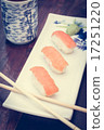 delicious sushi served  wooden table with tea 17251220