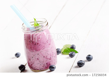 Blueberry shake on white table Blueberry shake on white table 17256034