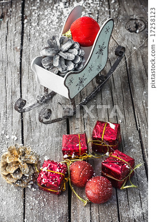 Christmas card with sleigh and ornaments 17258123