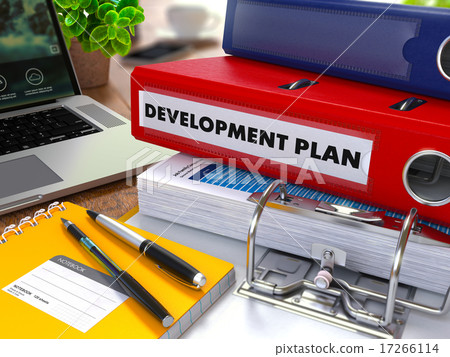 Red Ring Binder with Inscription Development Plan. 17266114