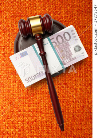 Wooden judge's gavel and money 17275547