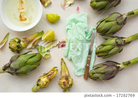 The process of peeling and cleaning artichoke The process of peeling and cleaning artichoke 17282769
