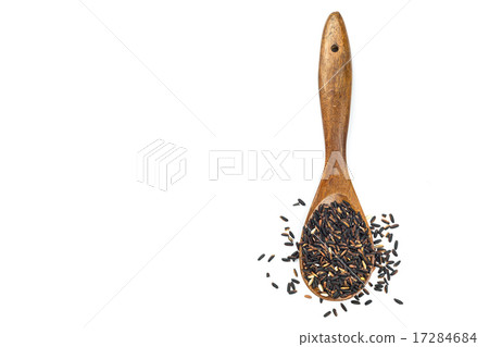 Thai black sticky rice in wooden spoon isolated on white 17284684