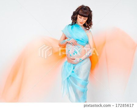 Young pregnant woman with bodyart on her belly Young pregnant woman with bodyart on her belly 17285617