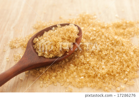 Sugar in a wooden spoon, Selective focus 17286276