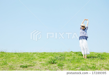 Lady standing on a hill Lady standing on a hill 17289395
