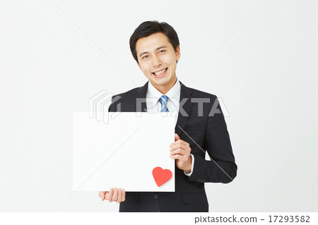 Businessman heart with message board Businessman heart with message board 17293582