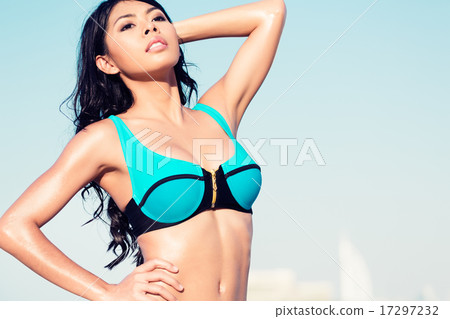 Sexy girl posing on city beach in vacation 17297232