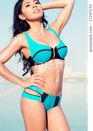 Sexy girl posing on city beach in vacation 17297233