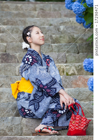 A woman looking up and smiling 17298471