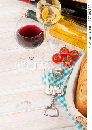 White and red wine, cheese and bread  17300345