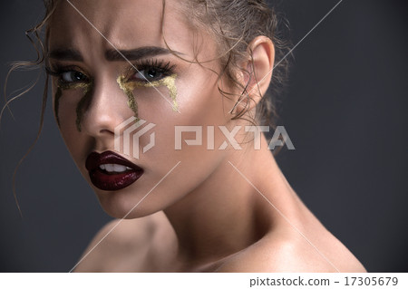 Art beauty close-up portrait of a beautiful model with curly hai 17305679