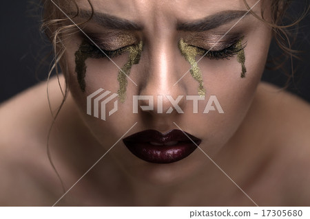 Art beauty close-up portrait of a beautiful model with curly hai 17305680