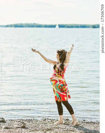 Beautiful pregnant woman and shore Beautiful pregnant woman and shore 17306709