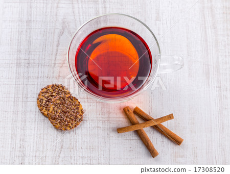 Cup of tea with mint on leaves wooden table Cup of tea with mint on leaves wooden table 17308520