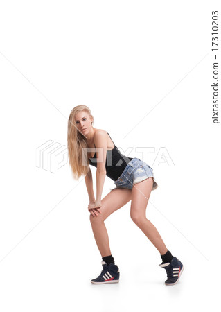 Young beautiful dancer posing on studio background 17310203