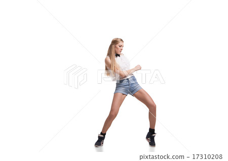 Young beautiful dancer posing on studio background 17310208