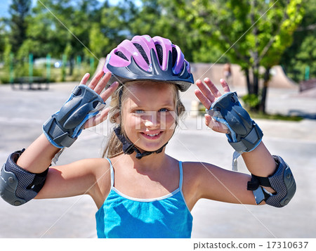 Girl riding on roller skates . Girl riding on roller skates . 17310637
