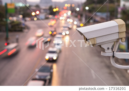 Security CCTV camera operating over the road Security CCTV camera operating over the road 17316201
