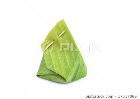 Sticky rice with steamed custard, wrapped in banana leaves Sticky rice with steamed custard, wrapped in banana leaves 17317069