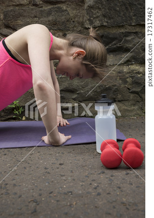 Athletic woman doing push-ups during outdoors. Athletic woman doing push-ups during outdoors. 17317462