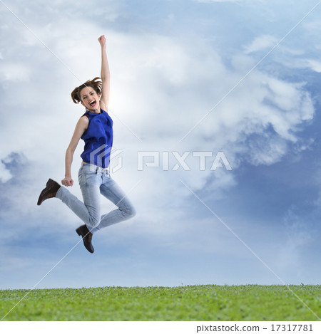 Happy woman jumping for joy. 17317781