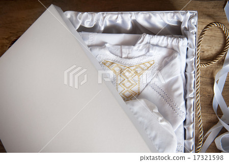 White robe embroidered with gold in a box White robe embroidered with gold in a box 17321598