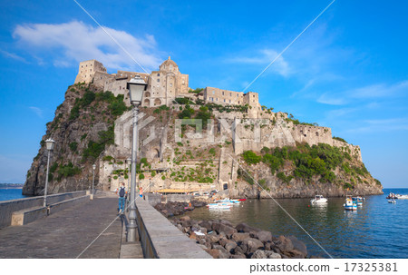 Ischia port with Aragonese Castle and road 17325381