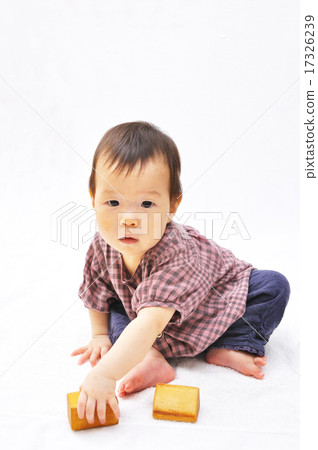 Baby playing with building blocks 17326239