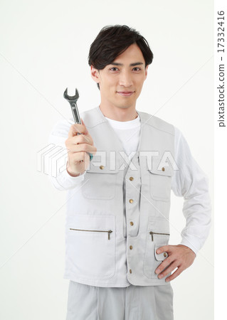 Young construction workers with tools Young construction workers with tools 17332416