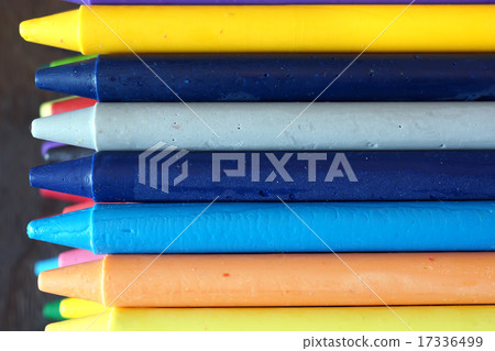 Oil pastel crayons on a wooden black table Oil pastel crayons on a wooden black table 17336499