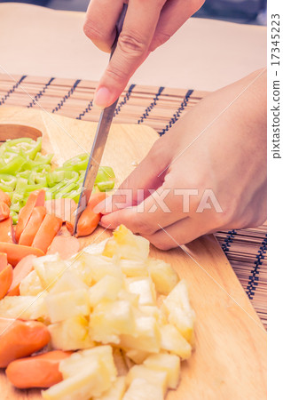 Preparing sausage and vegetables woman hands 17345223