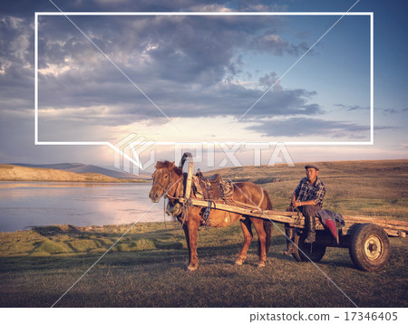 Horse Man Sitting On A Horse Cart In A Scenic View Of Nature 17346405