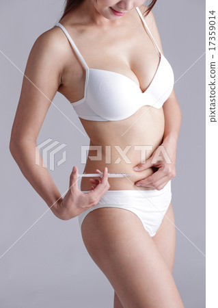 woman inject drugs on waist woman inject drugs on waist 17359014