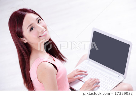 woman smile using laptop woman smile using laptop 17359082