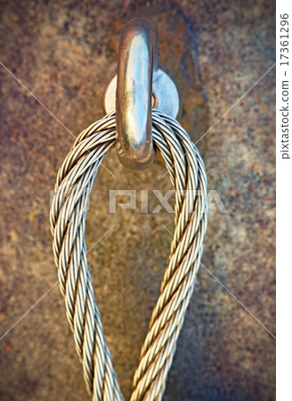 End knot of steel rope. Climbers path in rocks End knot of steel rope. Climbers path in rocks 17361296