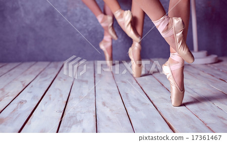 The feet of a young ballerinas in pointe shoes  17361467