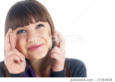 Attractive girl with crossed fingers Attractive girl with crossed fingers 17363656