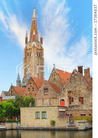 Bruges canal with Church of Our Lady on background 17364837