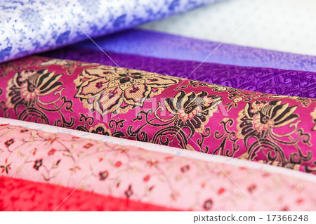 Rolls of fabric and textiles in a factory shop Rolls of fabric and textiles in a factory shop 17366248