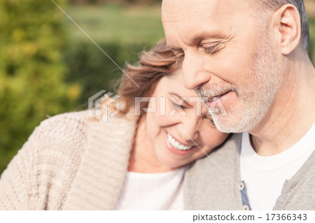 Cheerful old married couple is spending time together Cheerful old married couple is spending time together 17366343