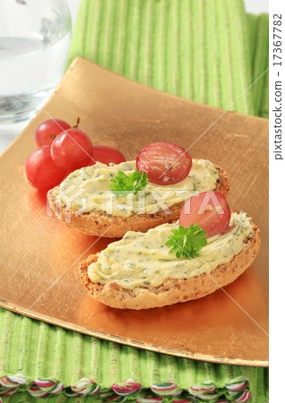 Whole grain crisp rolls with herb butter Whole grain crisp rolls with herb butter 17367782