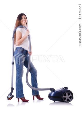 Young woman with vacuum cleaner on white 17370821