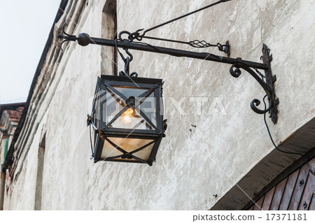 Ancient lantern on the wall Ancient lantern on the wall 17371181