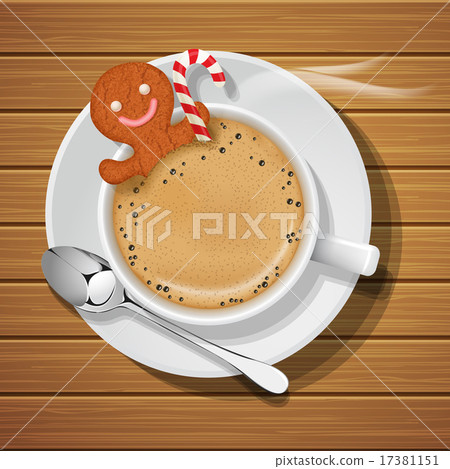 gingerbread in cup of hot coffeee with sugar cane 17381151