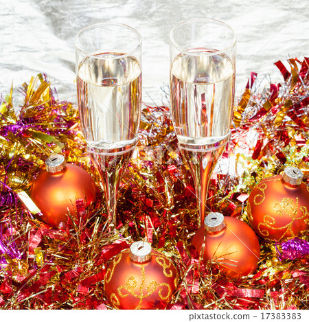 above view of glasses with orange Xmas decorations 17383383