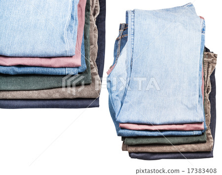 set of stacks of various jeans and corduroys 17383408